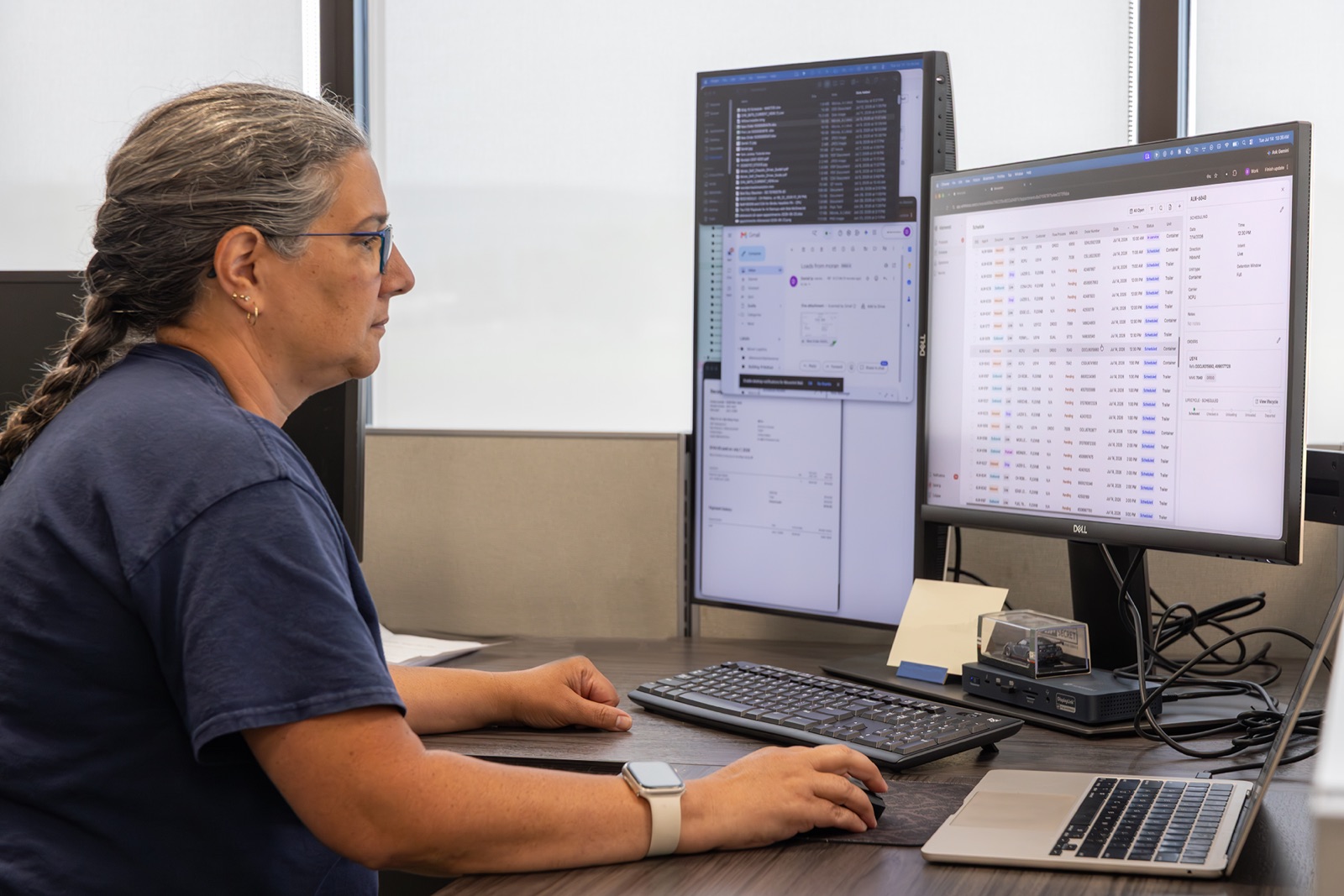 A customer service representative viewing appointments at a workstation